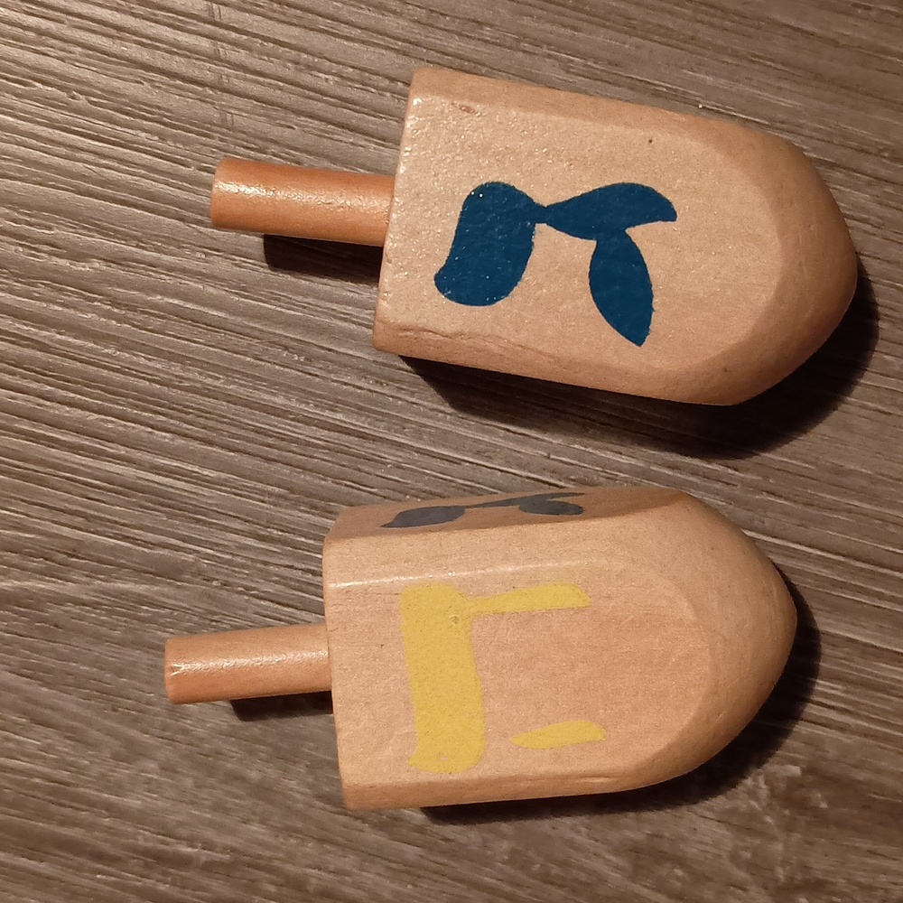 2 wooden dreidels Vintage 3 by 1 inches.